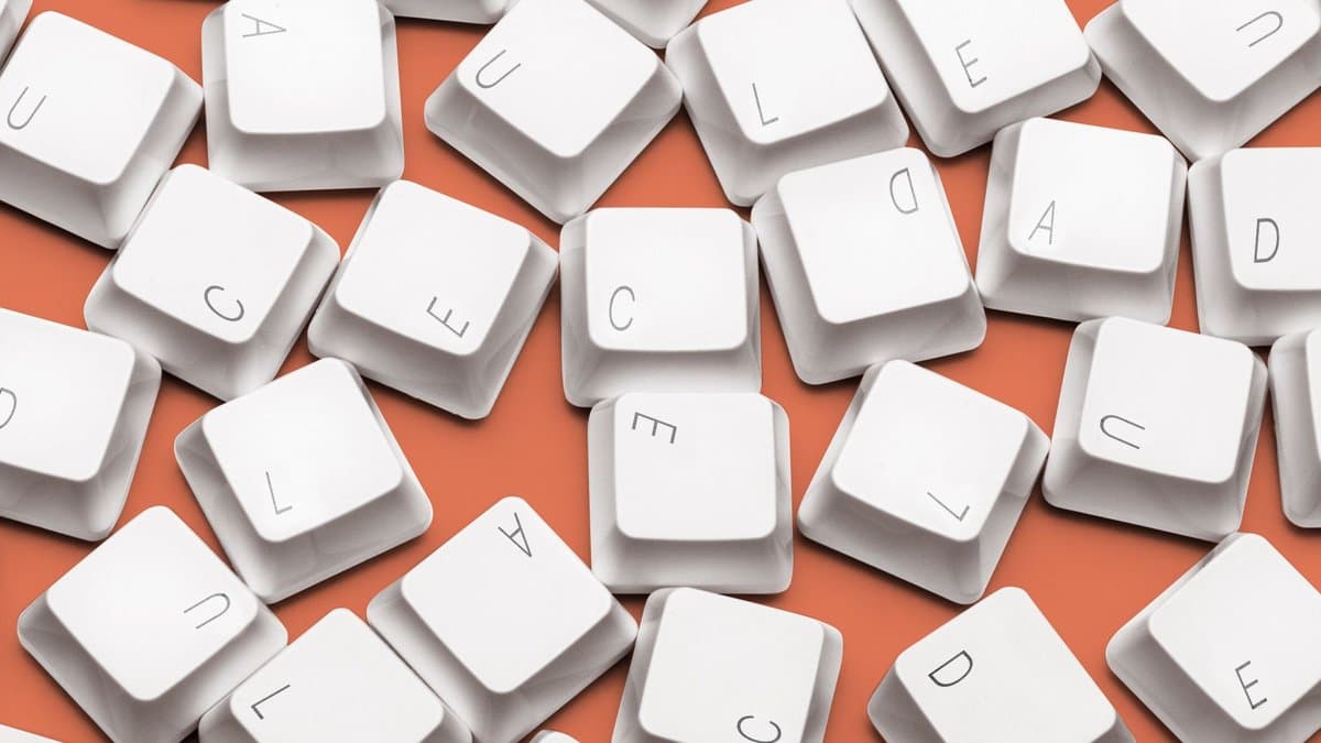 Illustration of keyboard keys with the letters C, L, A, U, D and E, all mixed up and jumbled.