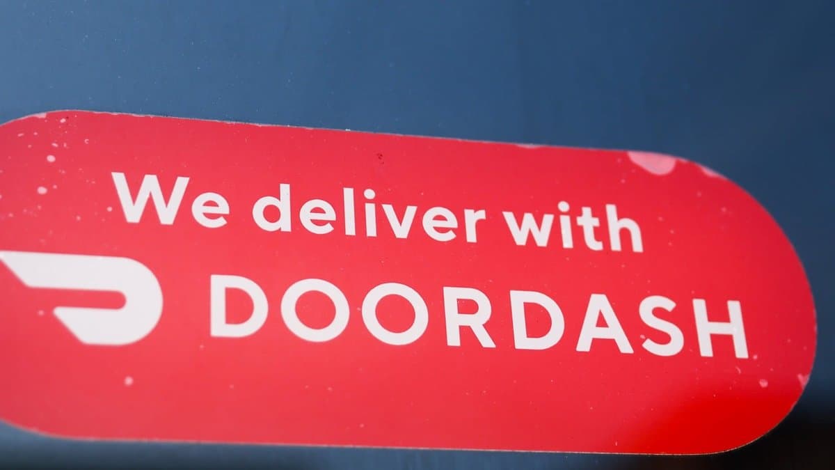DoorDash delivery ad outside a cafe in New York