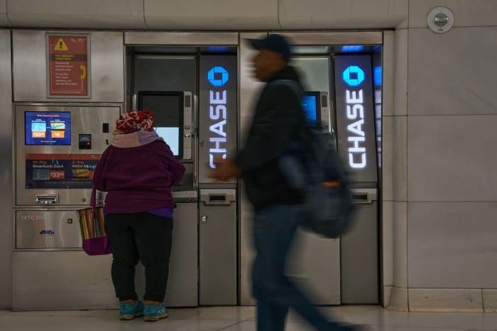 A customer using a JPMorgan Chase ATM.